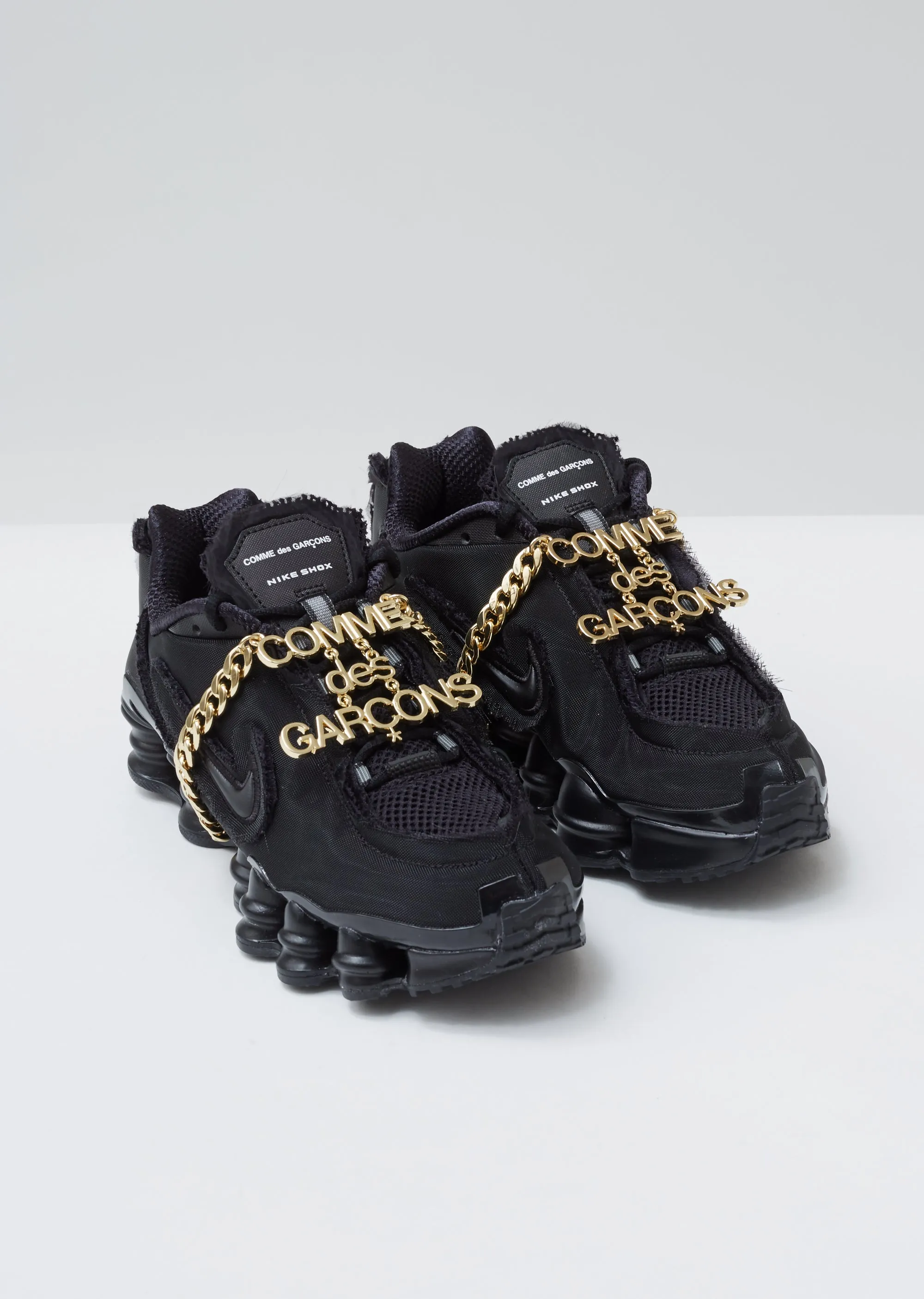 CDG x Nike Shox TL