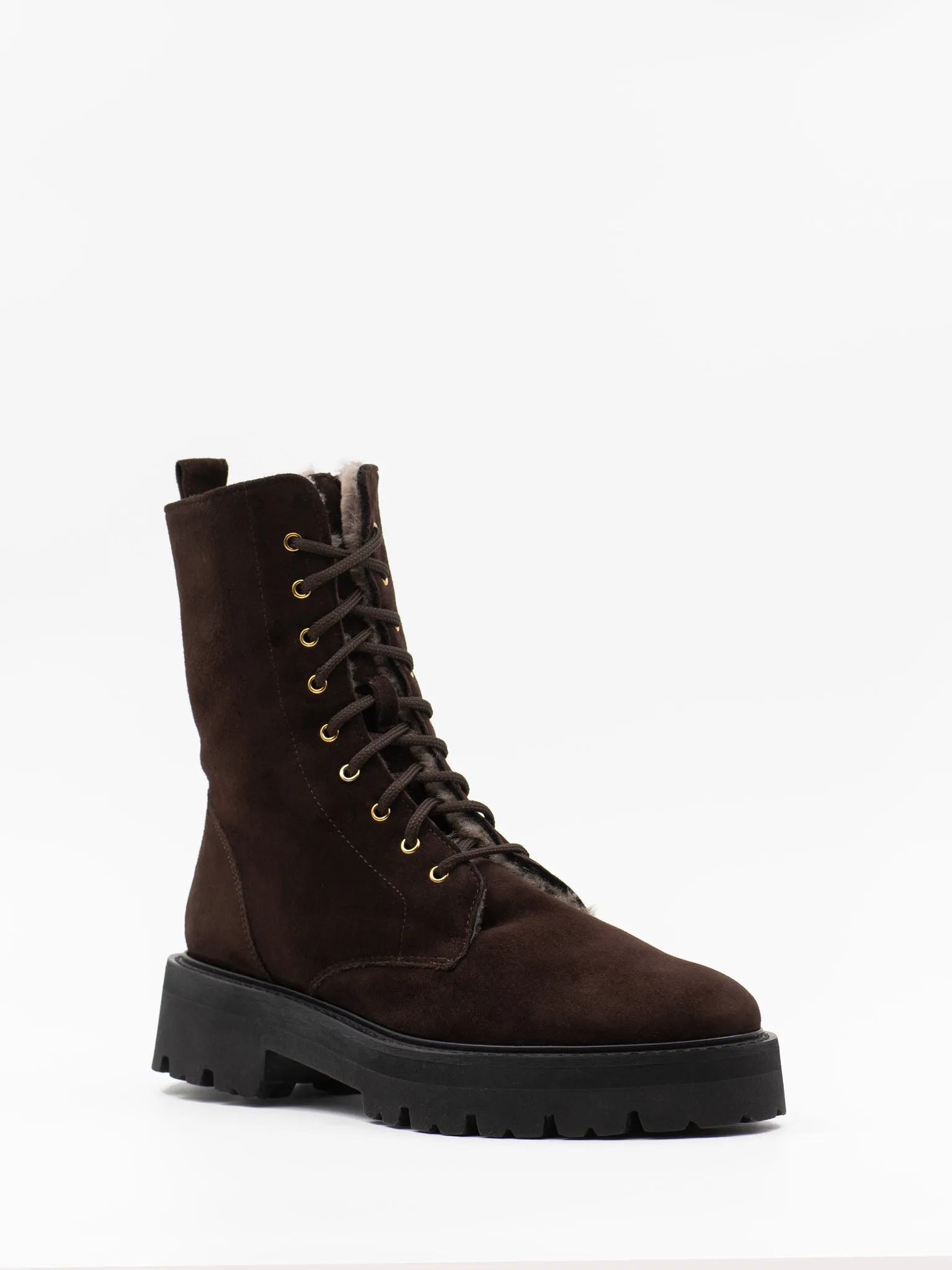 Shearling-lined combat boots in brown suede